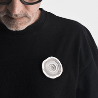 Jewellery artist Denis Music created a brooch dedicated to the Memorial Day of Babyn Yar victims